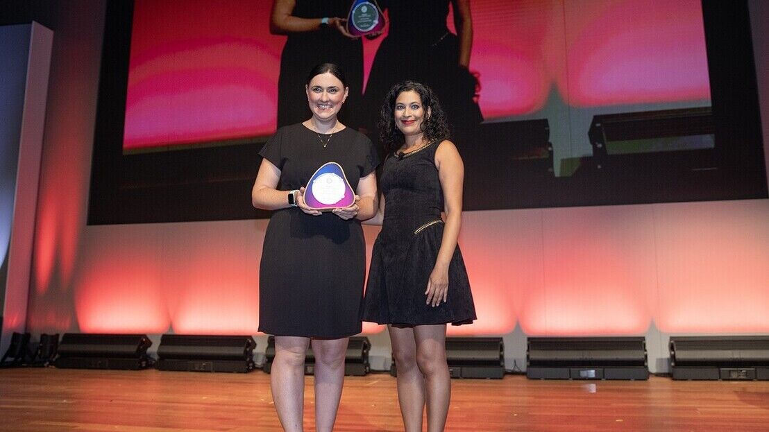 Jo Fahy accepts the award from Nadira Tudor.jpg